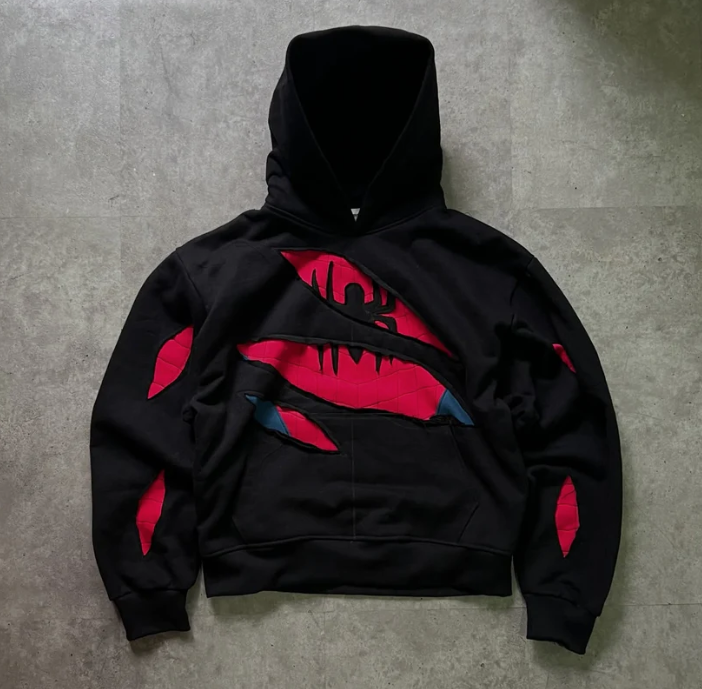 Sweat à capuche déchiré motif araignée